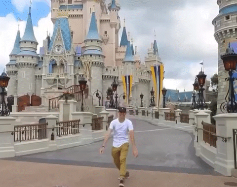JoJo Crichton dancing in front of Cinderella Castle