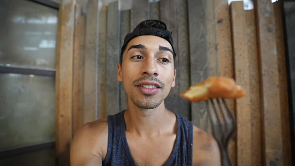 JoJo Crichton of JoJo's World enjoying  chicken wings