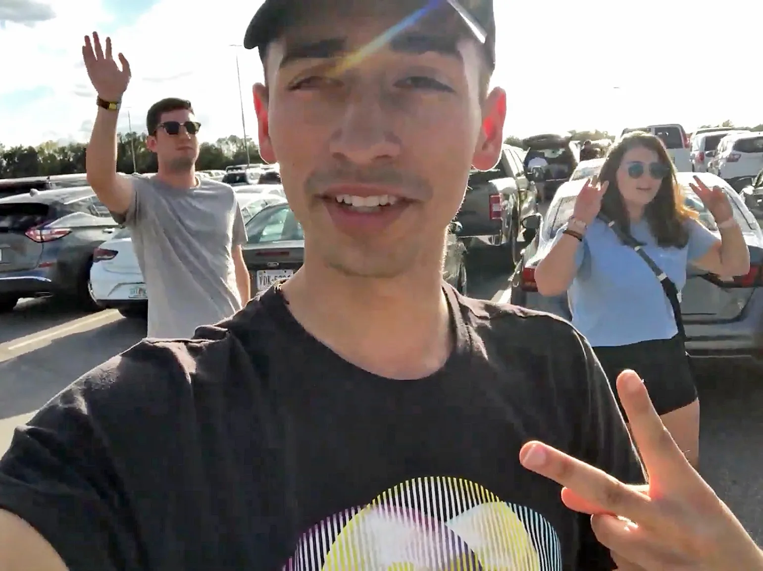 JoJo Crichton, Austin Wheeling and Emily Boornazian in parking lot at Disney's Animal Kingdom