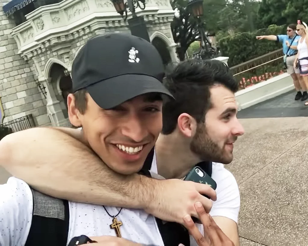 Kyle Pallo hugging JoJo Crichton at Magic Kingdom in Disney World