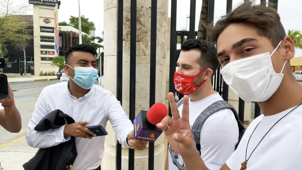 Kyle Pallo and JoJo Crichton being interviewed in Cozumel