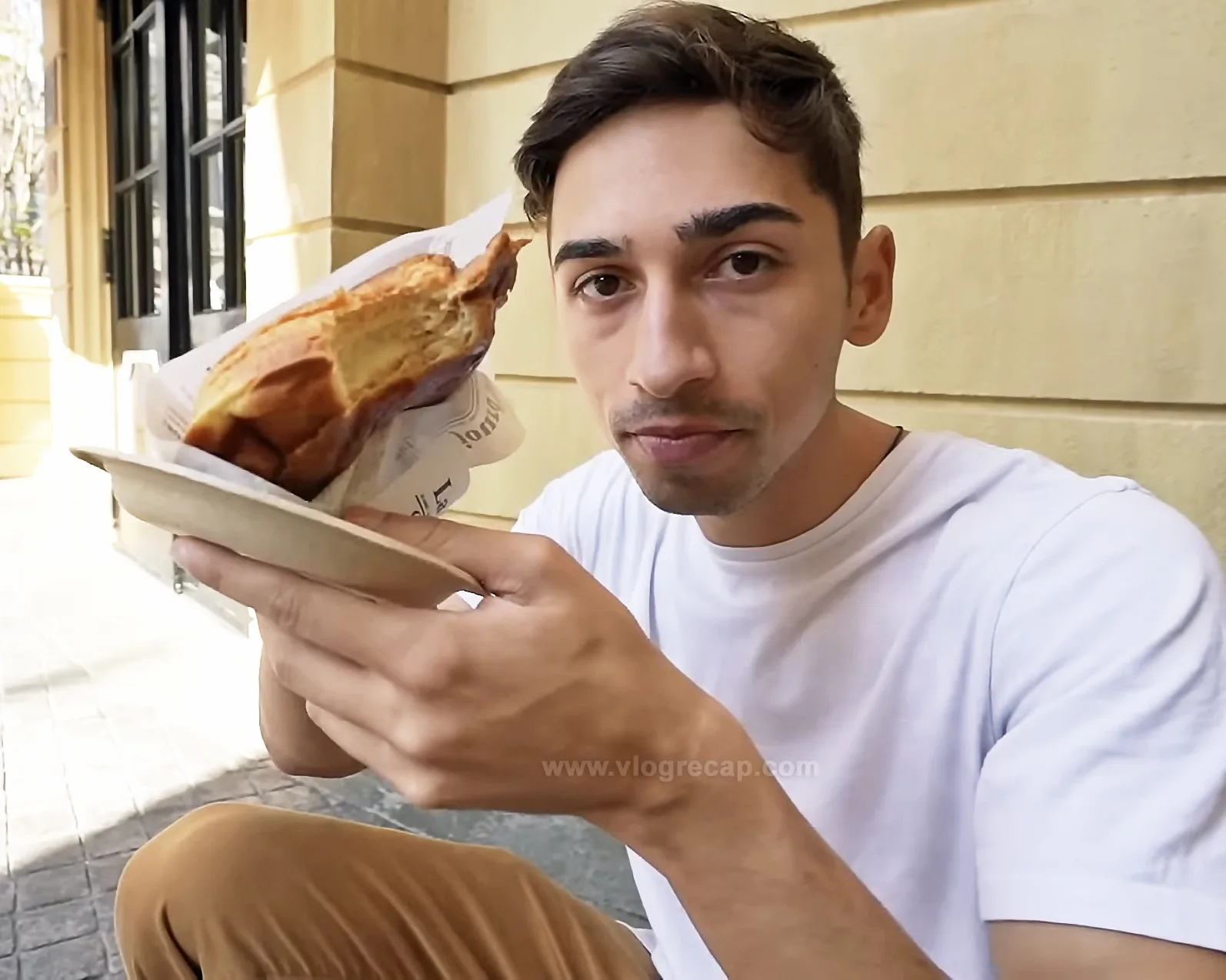 JoJo Crichton eating brioche ice cream sandwich from L'Artisan des Glaces in Epcot