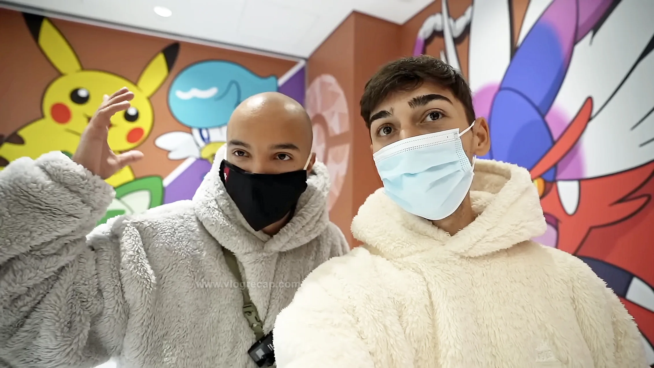 Jason Jete Jeter and JoJo Crichton taking selfies at Pokemon Center in central Tokyo, Japan