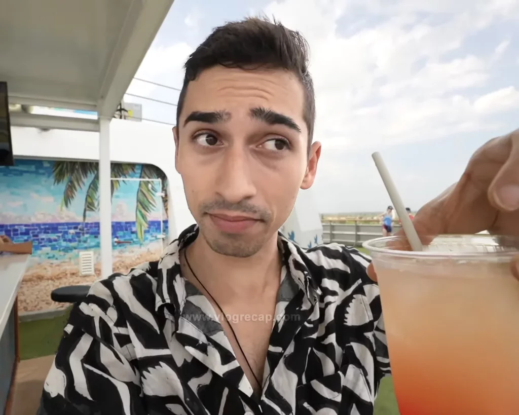 JoJo Crichton drinking on Margaritaville at Sea Paradise cruise