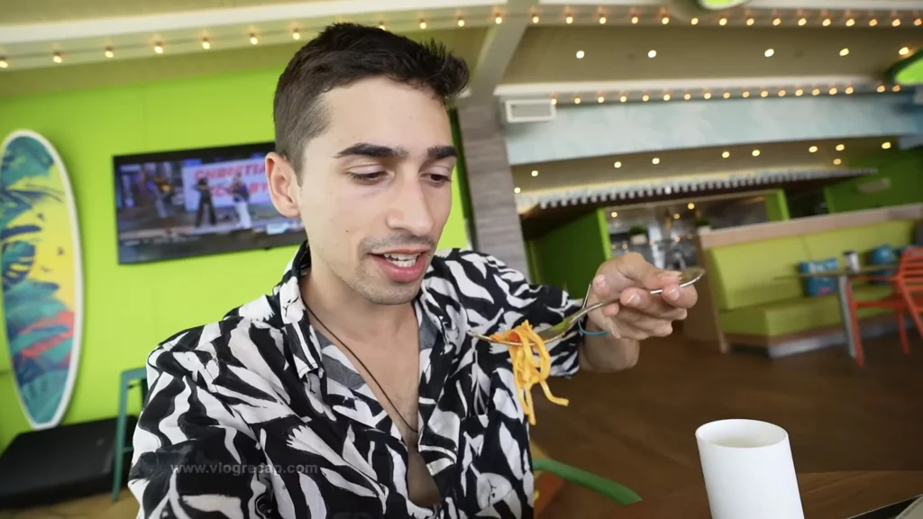 JoJo Crichton eating lunch on Margaritaville at Sea Paradise cruise