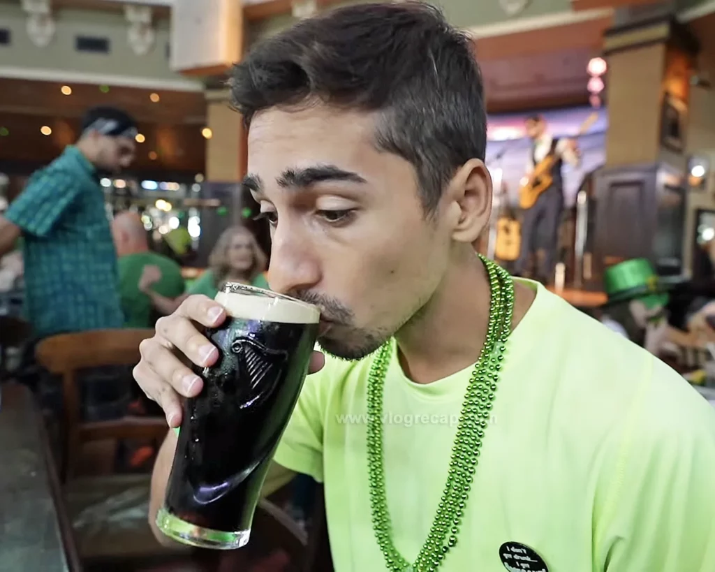 JoJo Crichton drinking beer at Raglan Road at Disney Springs