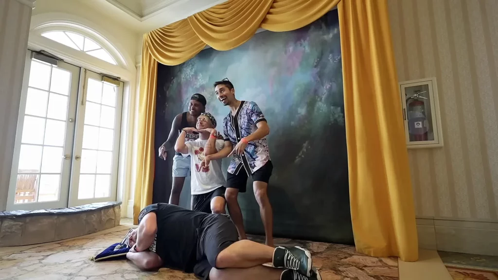 Pete Carney, Farris Khan, Ryan Martel, JoJo Crichton getting a glass slipper photo at the Grand Floridian