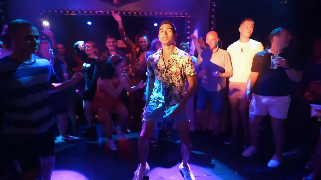 JoJo Crichton dancing on the Virgin Voyages' Valiant Lady cruise ship