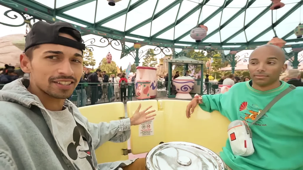 JoJo Crichton and Jete riding Mad Hatter's Teacups