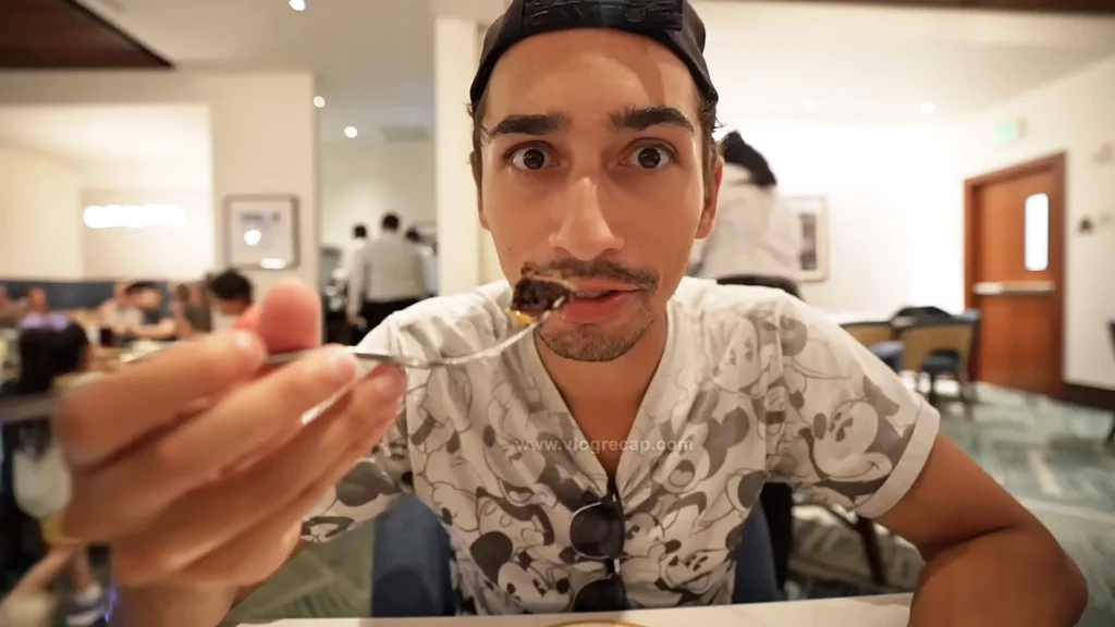 JoJo Crichton eating cake at Steakhouse 71 in the Contemporary Resort