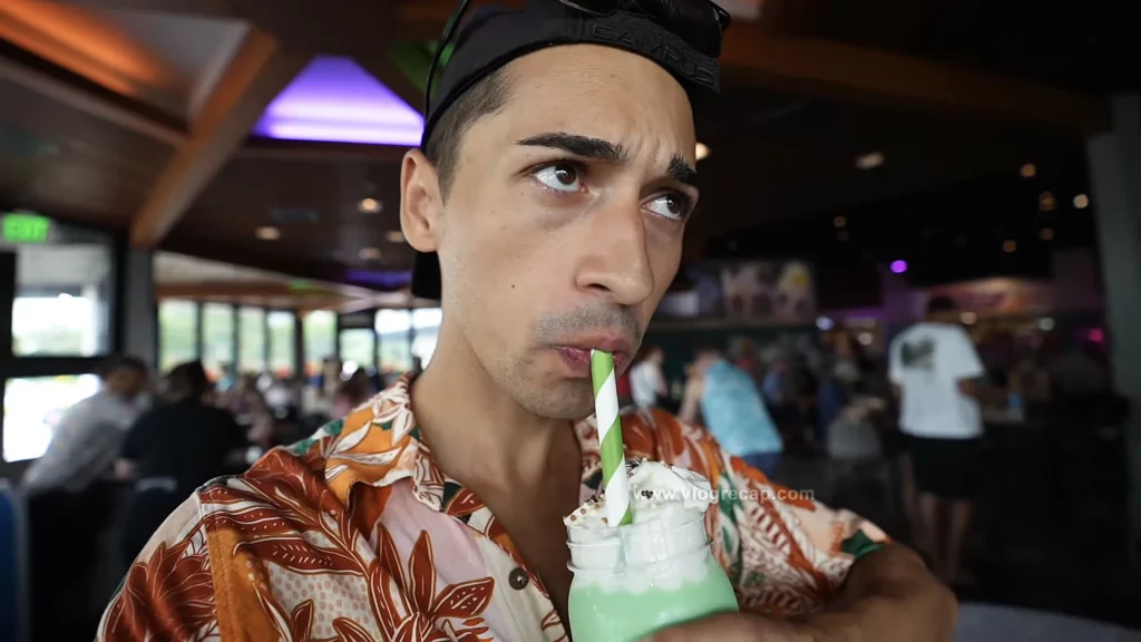 JoJo trying the new pickle milkshake at Epcot's Food & Wine Fesitival