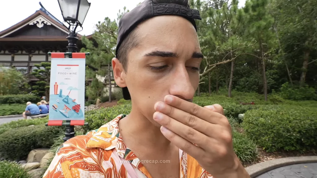 JoJo Crichton eating some bad sushi in the Japan Pavilion at Epcot.