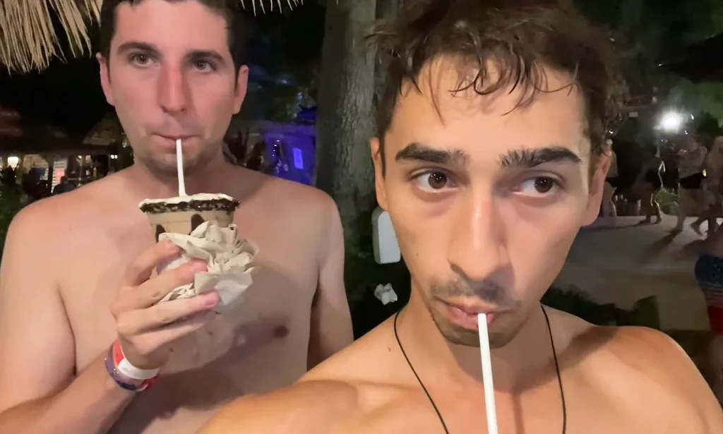 Austin Wheeling and JoJo Crichton drinking at H2O Glow at Typhoon Lagoon