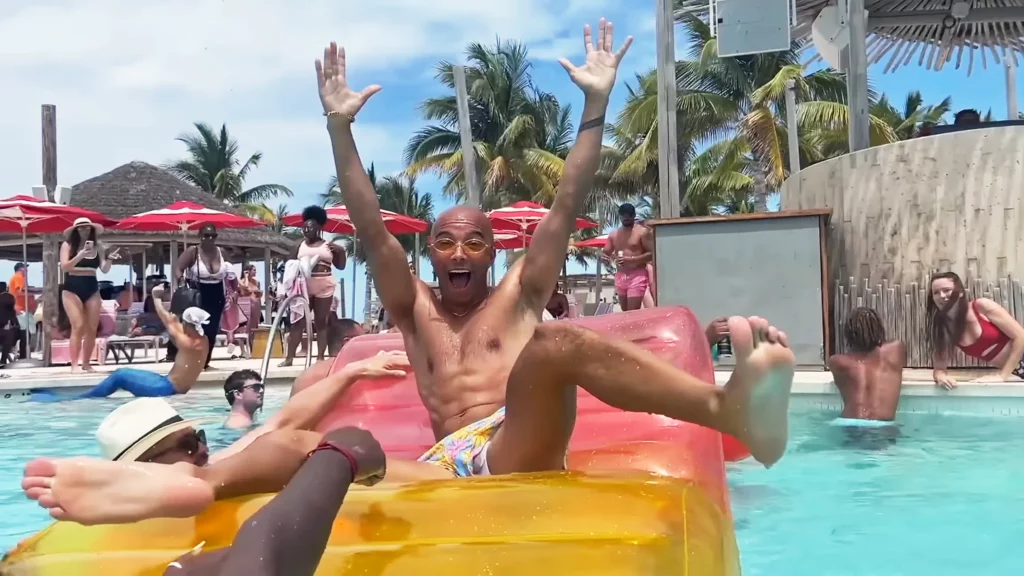 Jete (Jason Jeter, aka showmelovejete), at Virgin Voyages' beach club