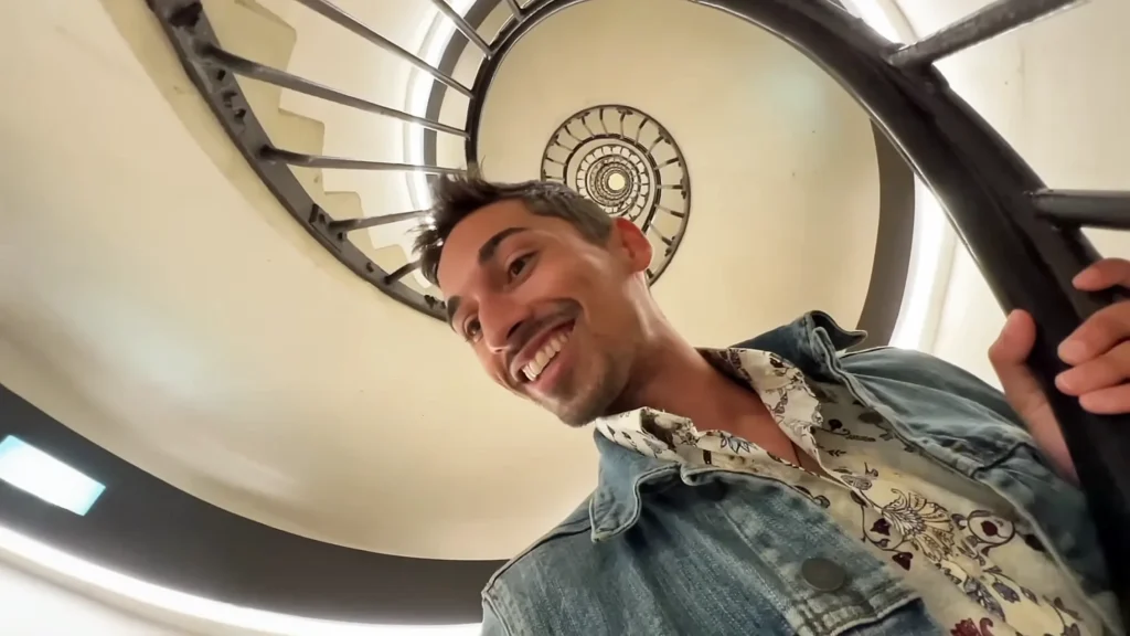 JoJo Crichton climbing the stairs at the Arc de Triomphe