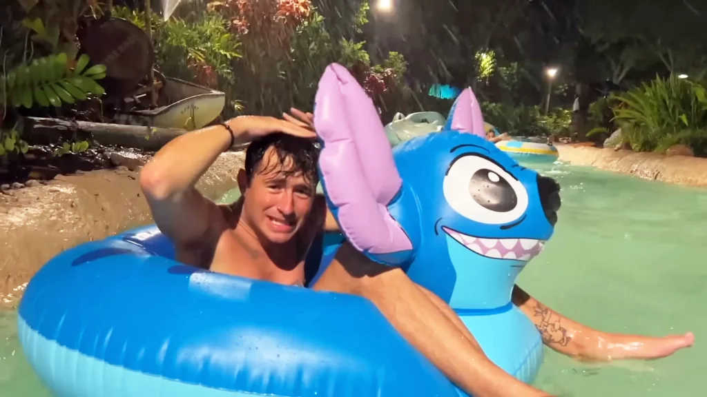 Ryan Martel sitting on Stitch tube on Castaway Creek in Typhoon Lagoon