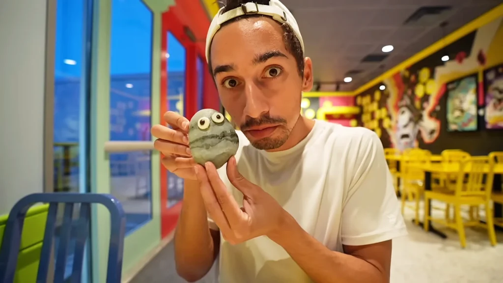 JoJo Crichton with Otto's Pet Rock at Minion Cafe at Universal Studios