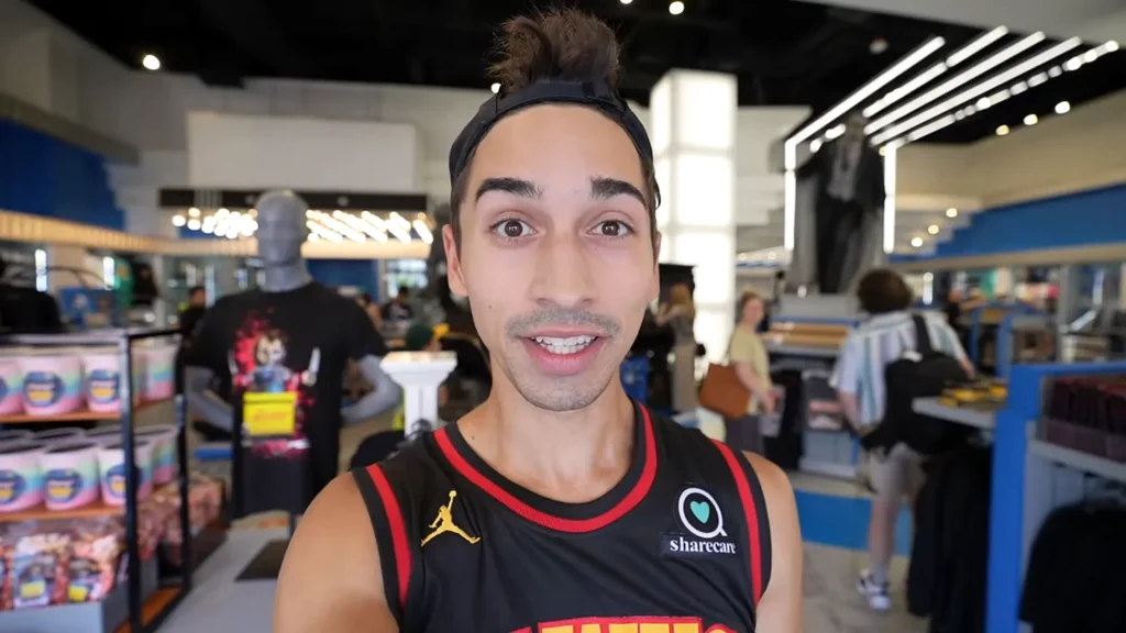 JoJo Crichton looking at Hollywood Horror Nights merchandise