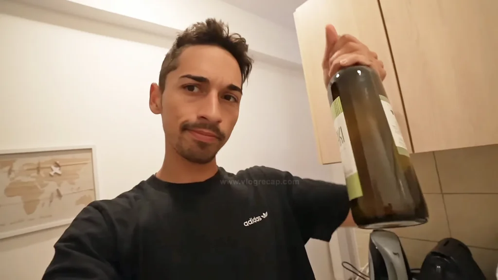 JoJo Crichton in Athens, Greece, with bottle of wine